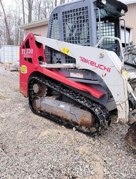 how to raise cab on tl230 takeuchi skid steer|skid steer tl10 lift.